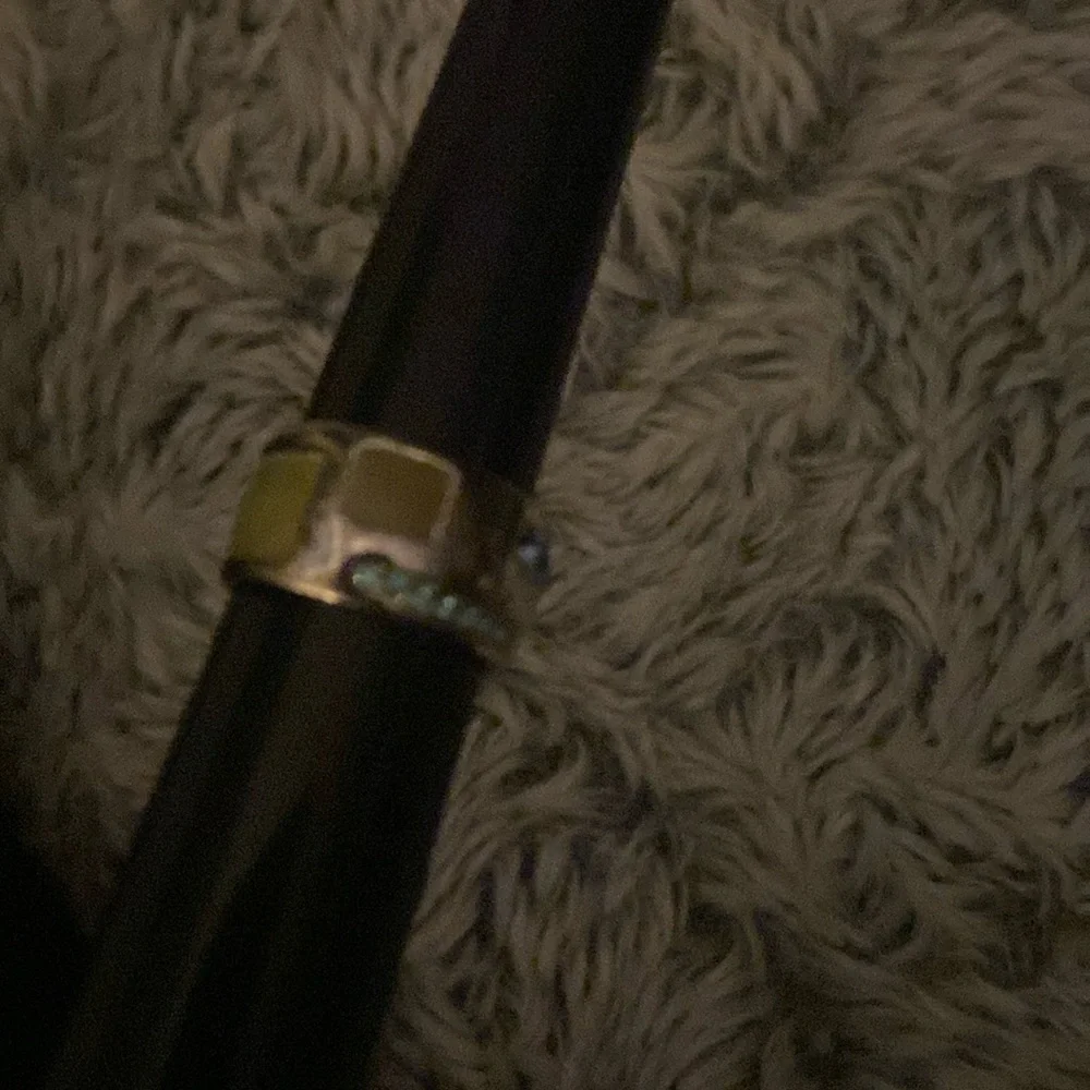Silver tone band ring with green enamel and blue stones size 7.5/8